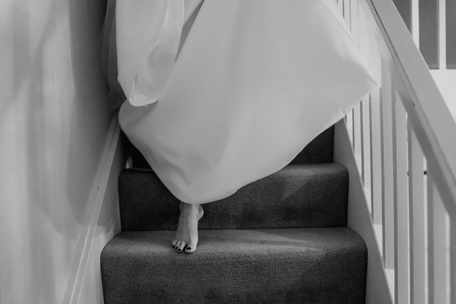 bride coming down stairs 